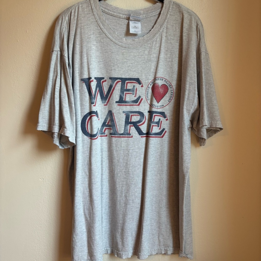 Gray 'We Care' Graphic T-Shirt